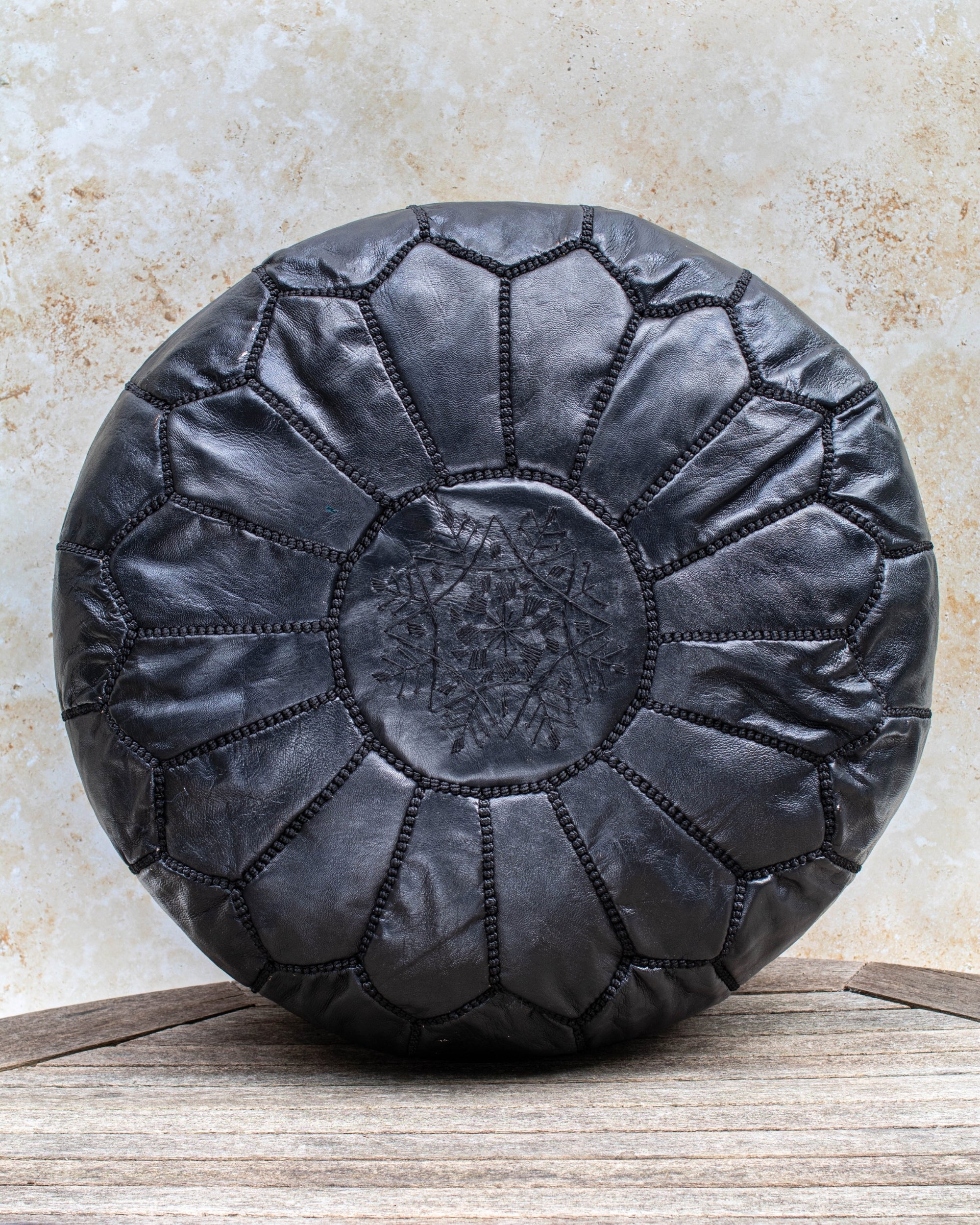 Black Moroccan leather pouf – front view