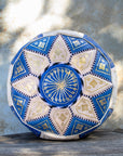 Blue and cream Moroccan leather pouf with gold embroidery front view