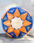 Blue and orange Moroccan leather pouf with gold embroidery front view