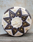 Brown and cream Moroccan leather pouf with gold embroidery front view