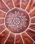 Brown leather pouf – concealed zip at base