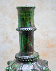 Close-up of glossy green glaze and raised detailing on Tamegroute vase