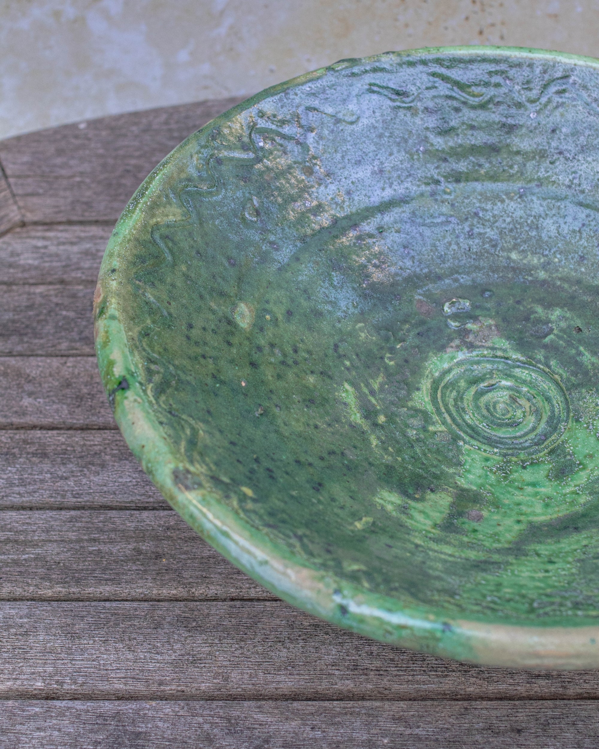 Close-up of glossy green glaze on Tamegroute pottery