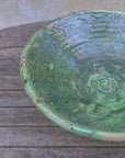 Close-up of glossy green glaze on Tamegroute pottery