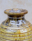 Close-up of handmade glaze texture and ribbed surface