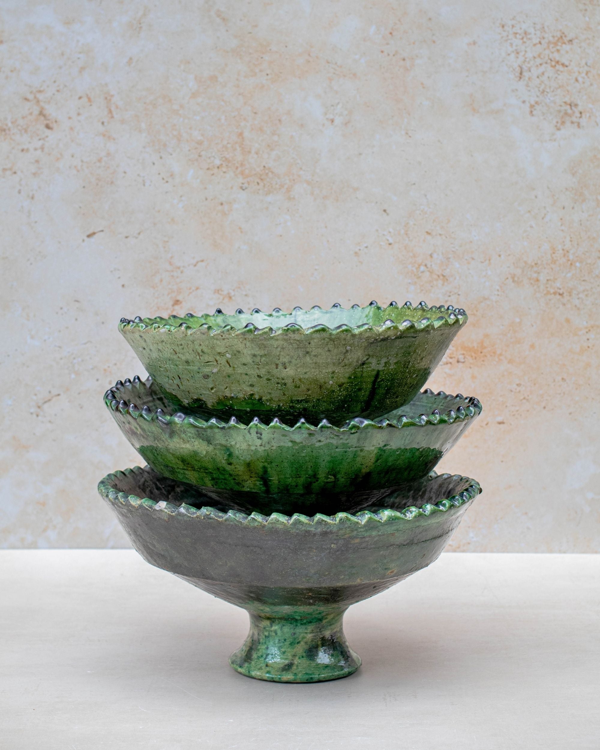 Detail shot of pedestal base and hand-thrown texture