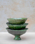 Detail shot of pedestal base and hand-thrown texture