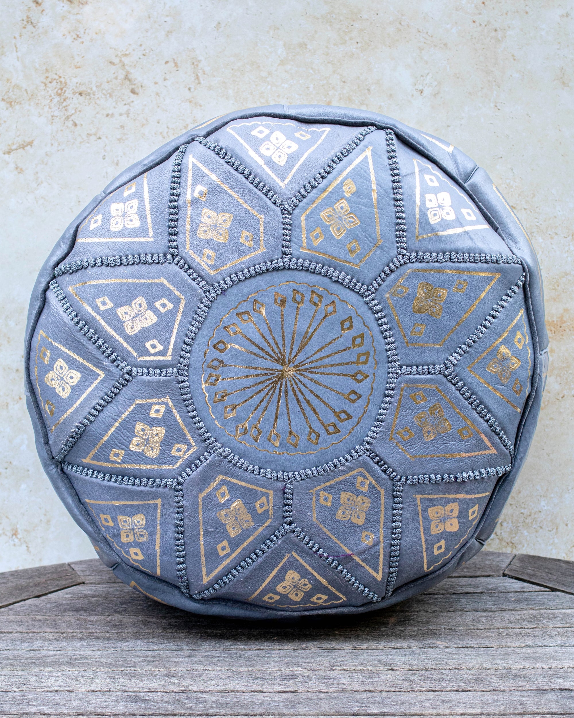 Grey Moroccan leather pouf with gold embroidery – front view