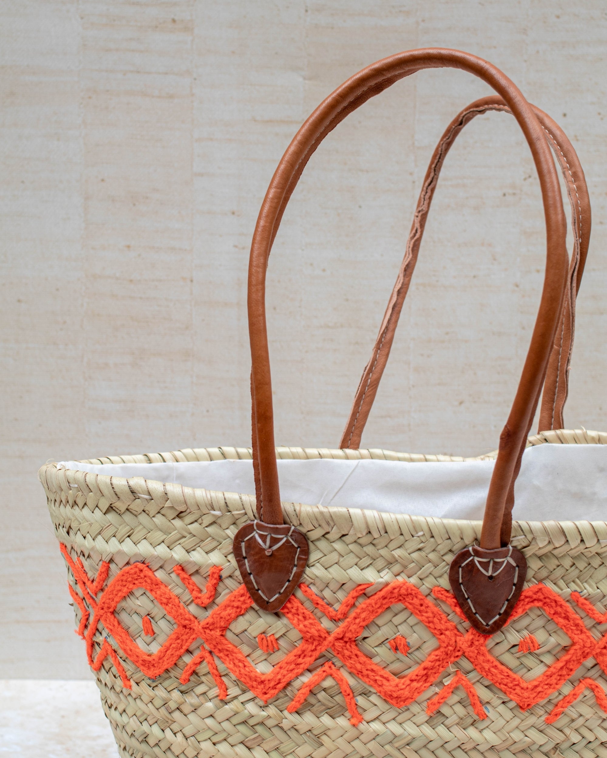 Group image – orange embroidered basket with other styles