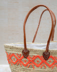 Group image – orange embroidered basket with other styles