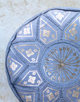 Hand-stitched grey leather pouf – embroidery detail close-up