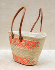 Handwoven French market basket – orange embroidery, front view