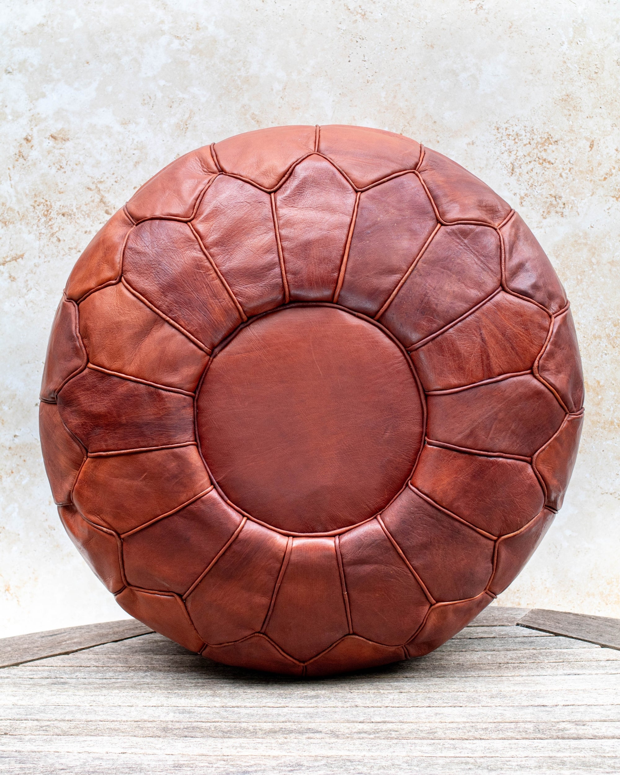 Tan Moroccan leather pouf – front view