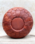 Tan Moroccan leather pouf – front view