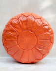 Moroccan leather pouf – orange, front view