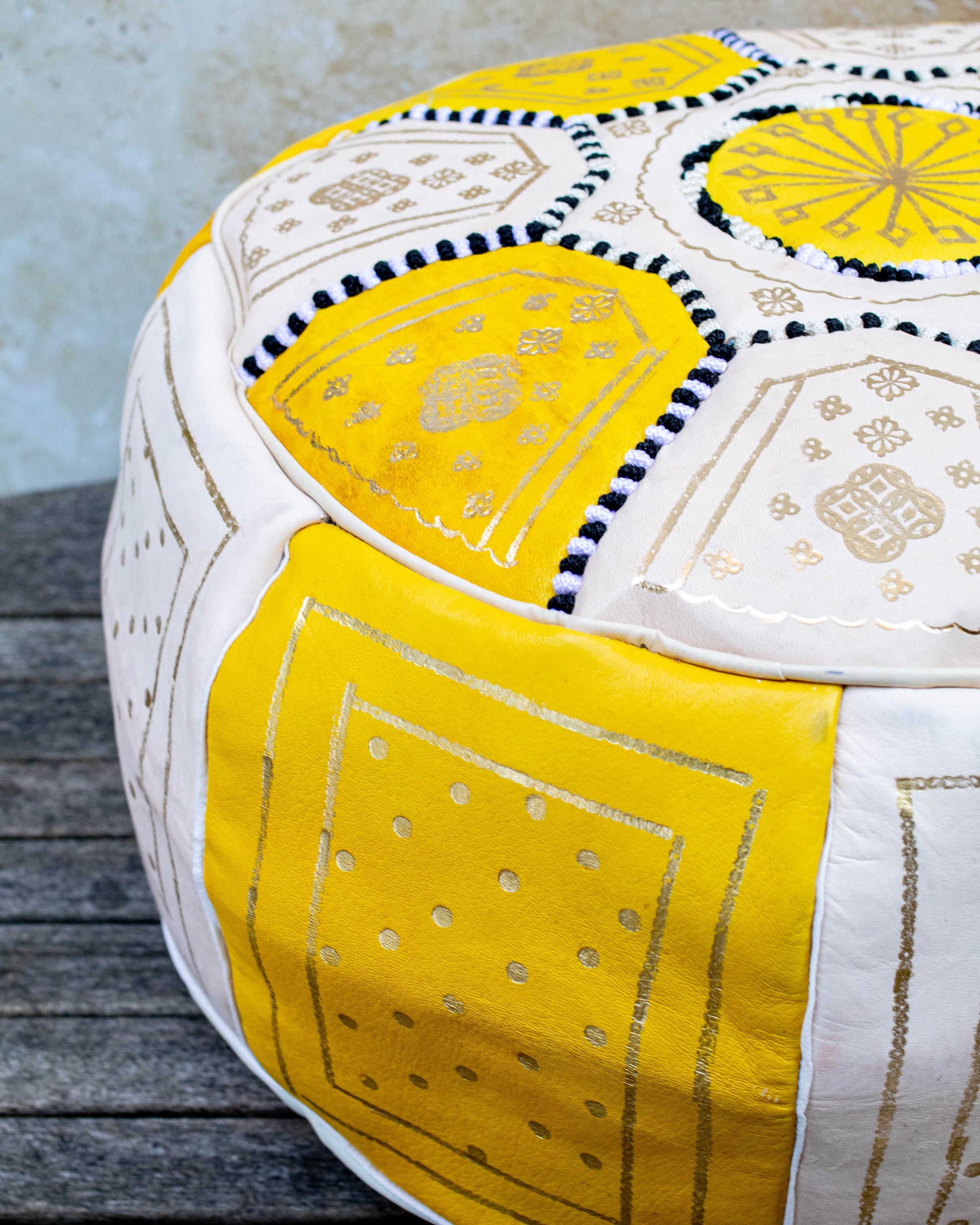 Moroccan leather pouf styled in living room