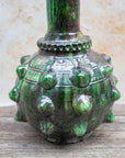 Moroccan pottery vase in deep green with bronze undertones