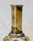 Moroccan pottery vase with carved snake motifs