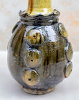 Ochre and brown glazed vase with tall neck