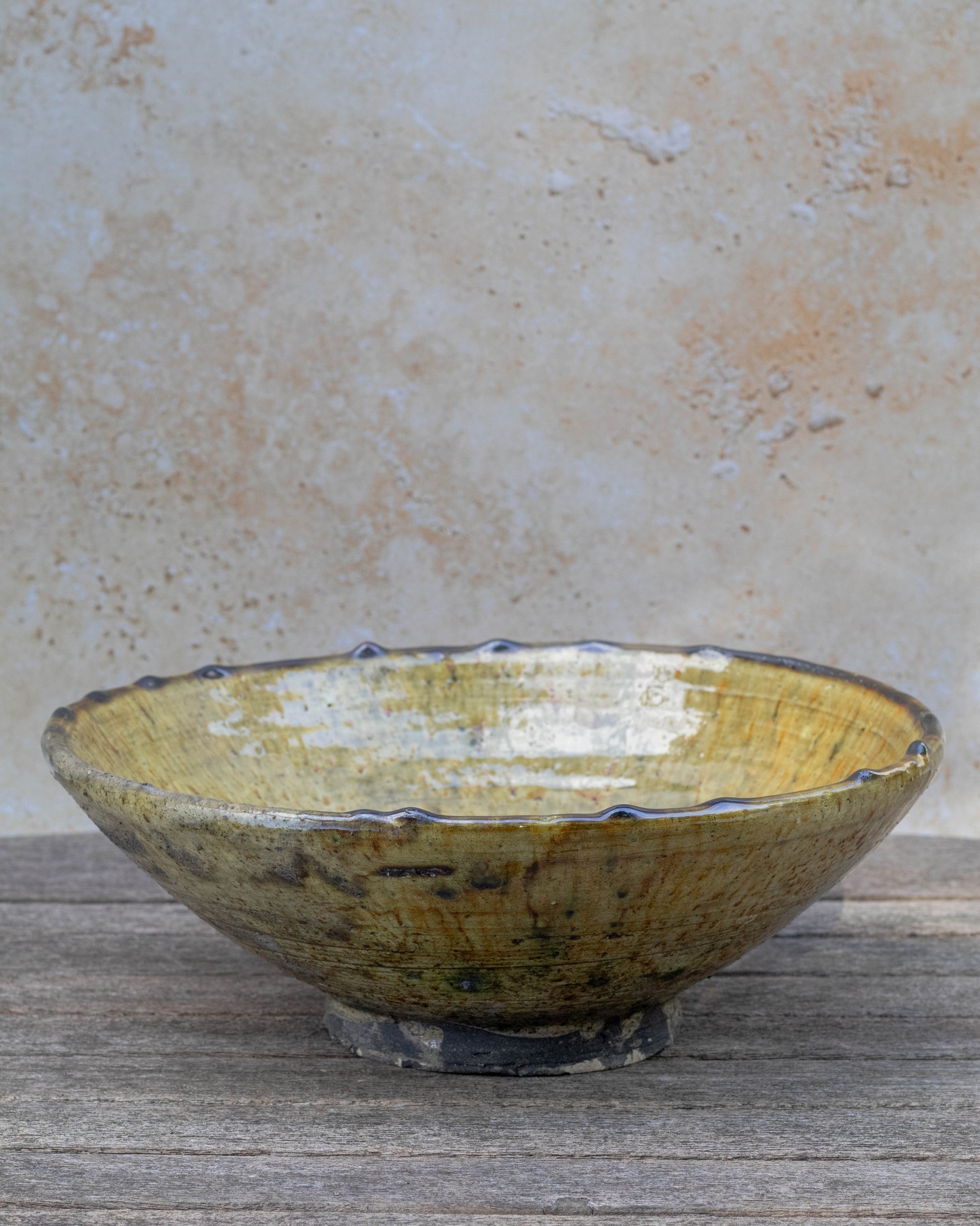 Ochre glazed Moroccan bowl front view in natural light