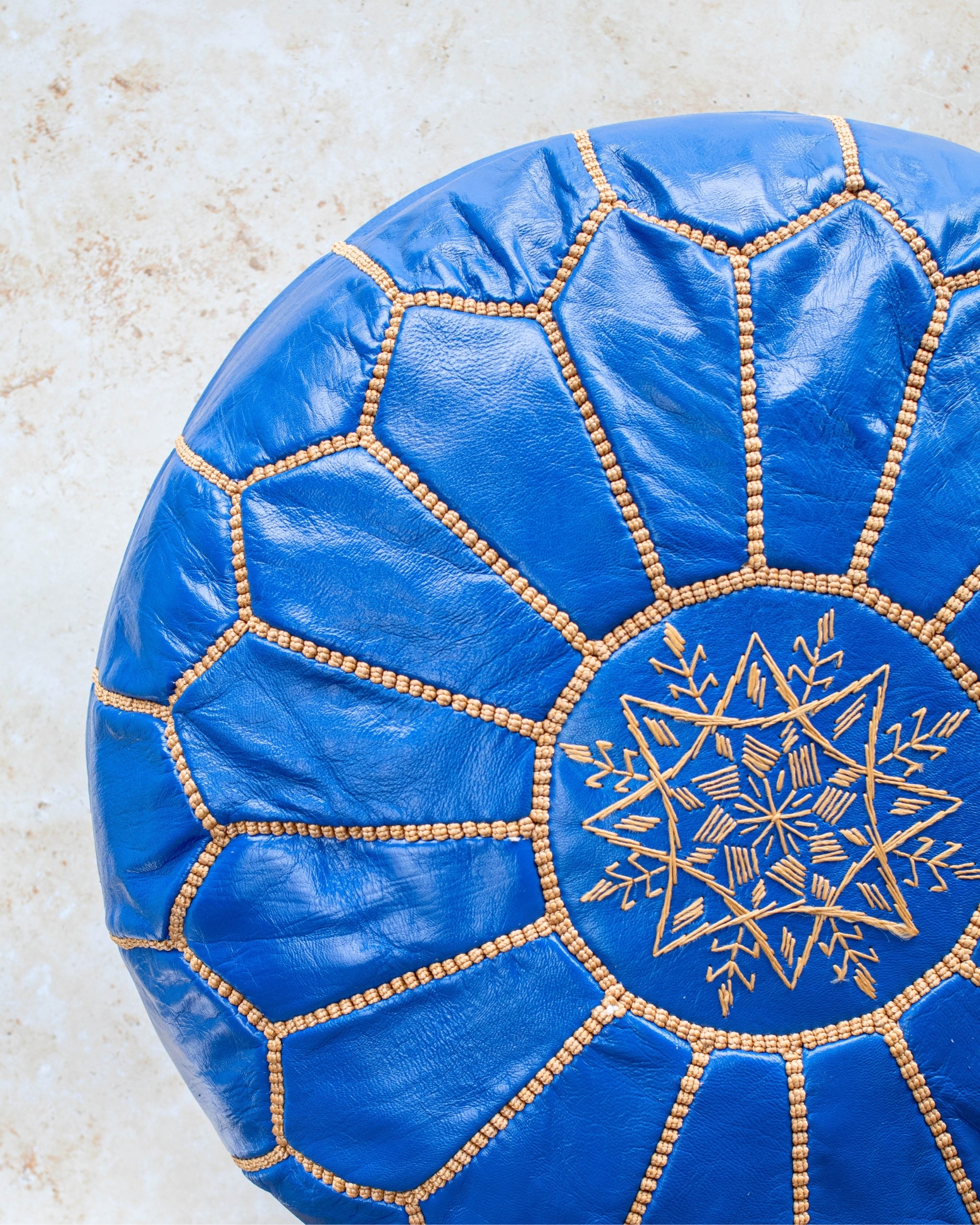 Royal blue pouf stitch detail close up