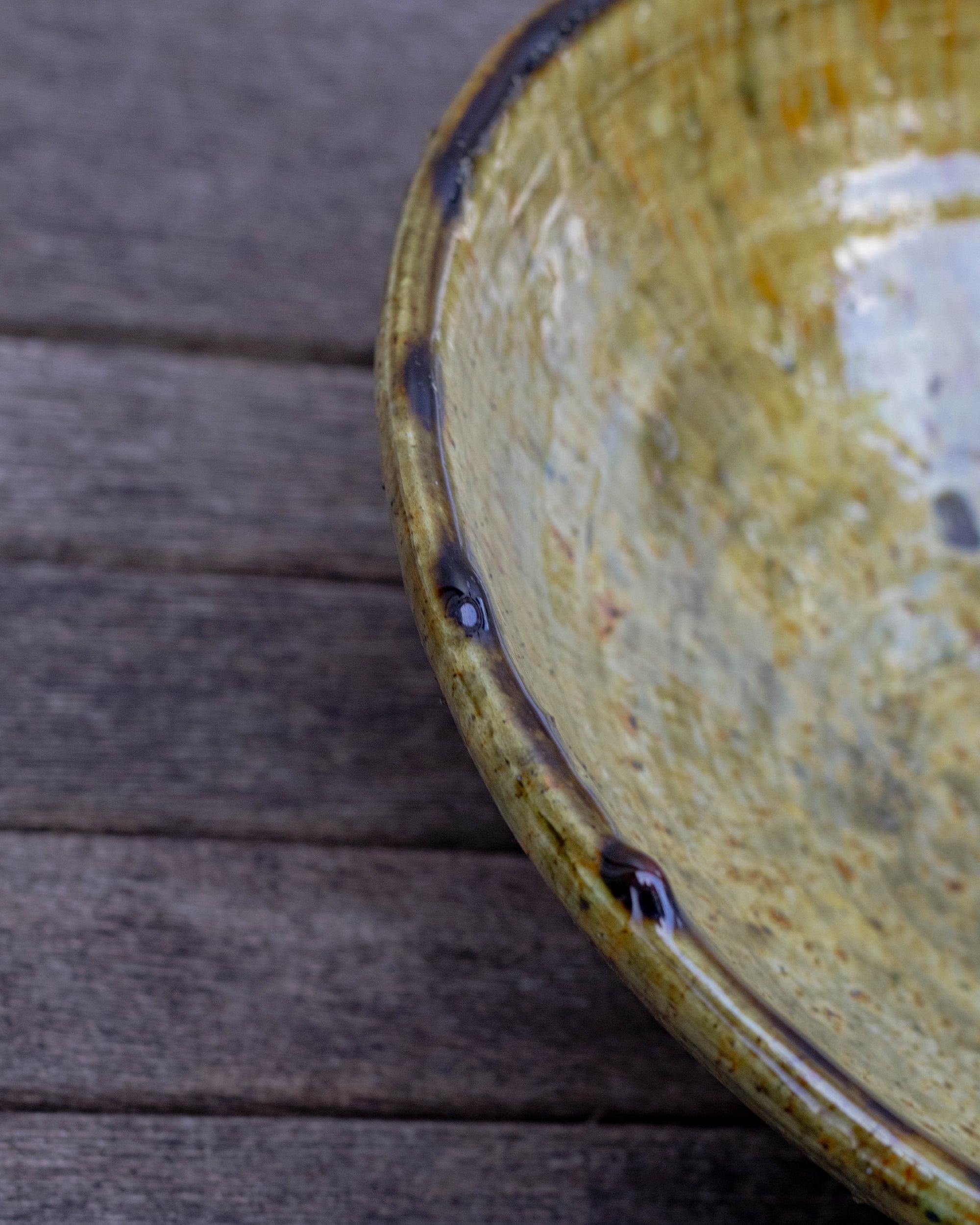Stack of ochre serving bowls by Maison Berber