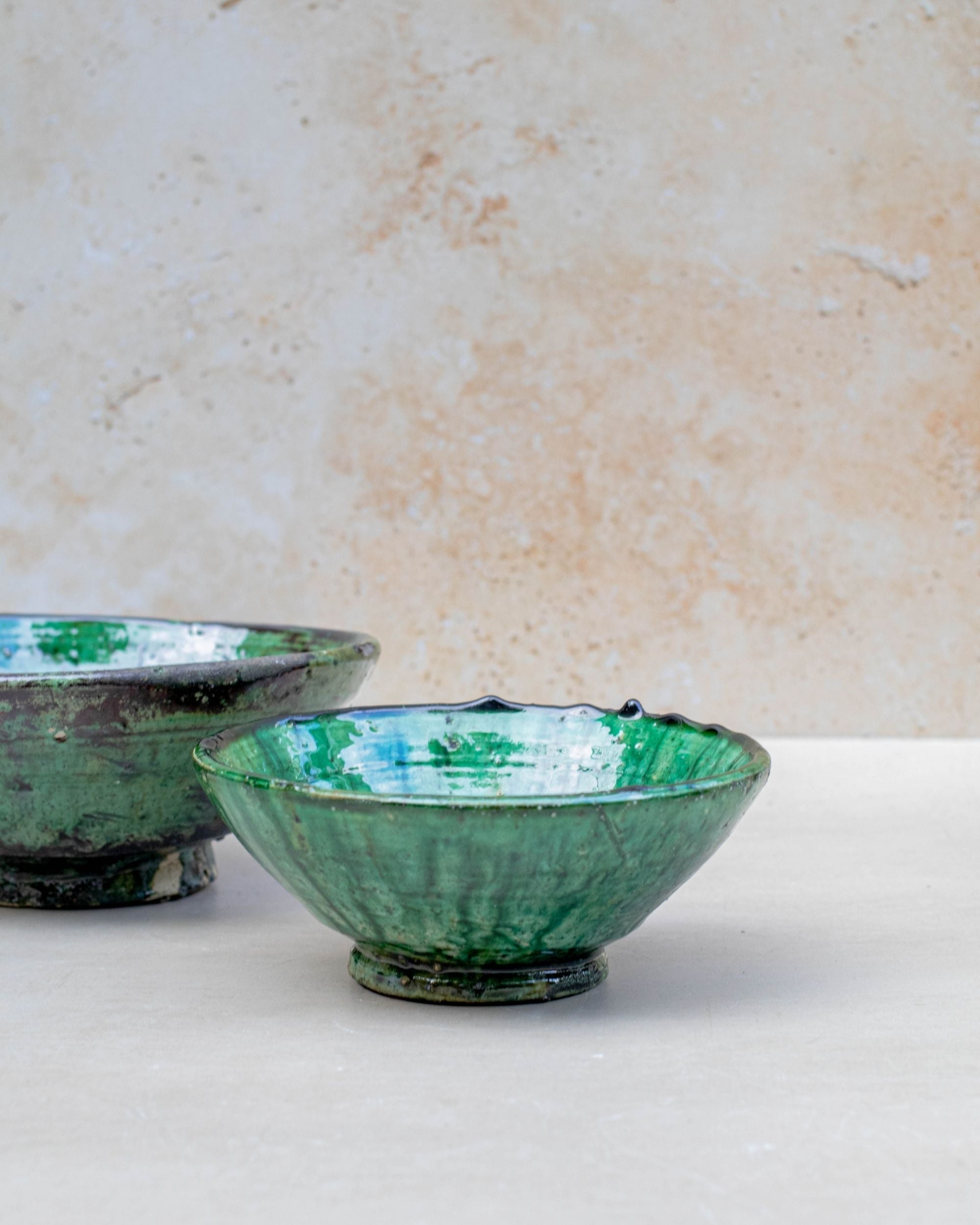 Tamegroute green bowl styled with fruit on tabletop