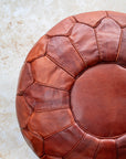 Tan leather pouf – stitching detail close up