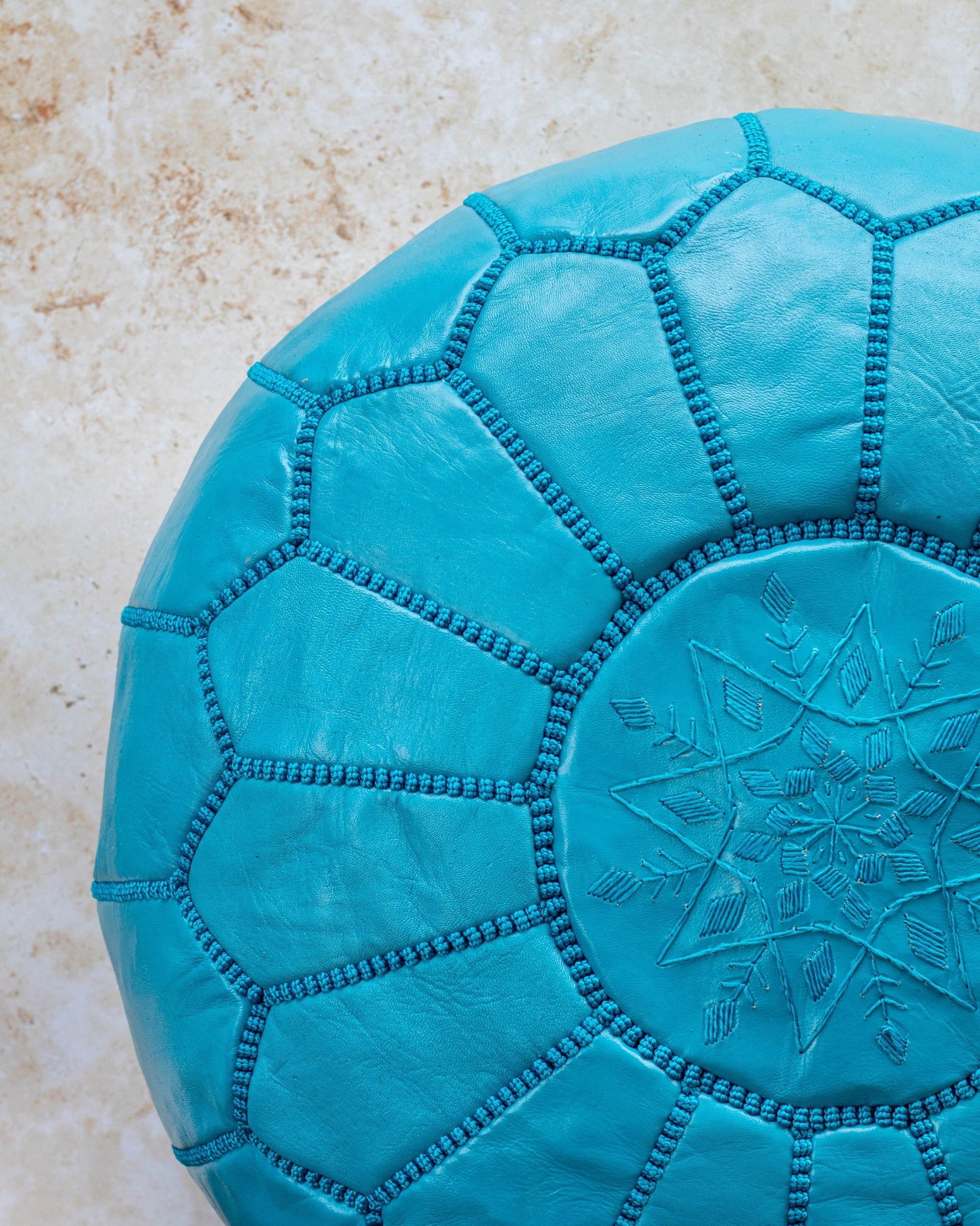 Teal leather pouf – stitch detail close up