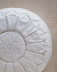 White leather pouf – close up of stitching