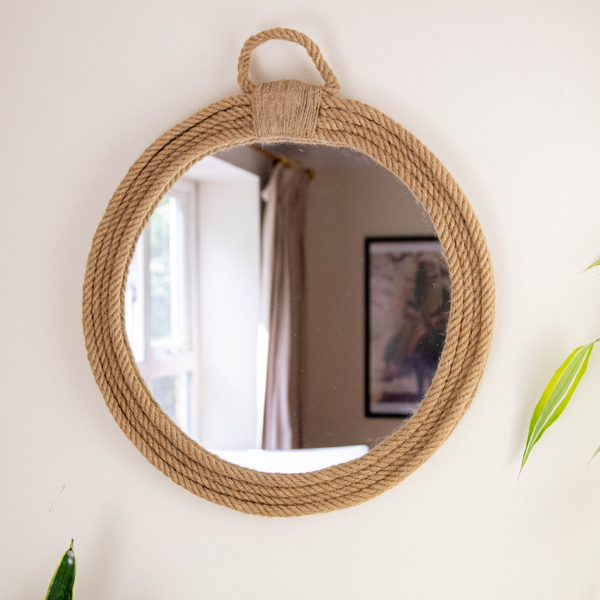 Rustic round mirror retailer with rope