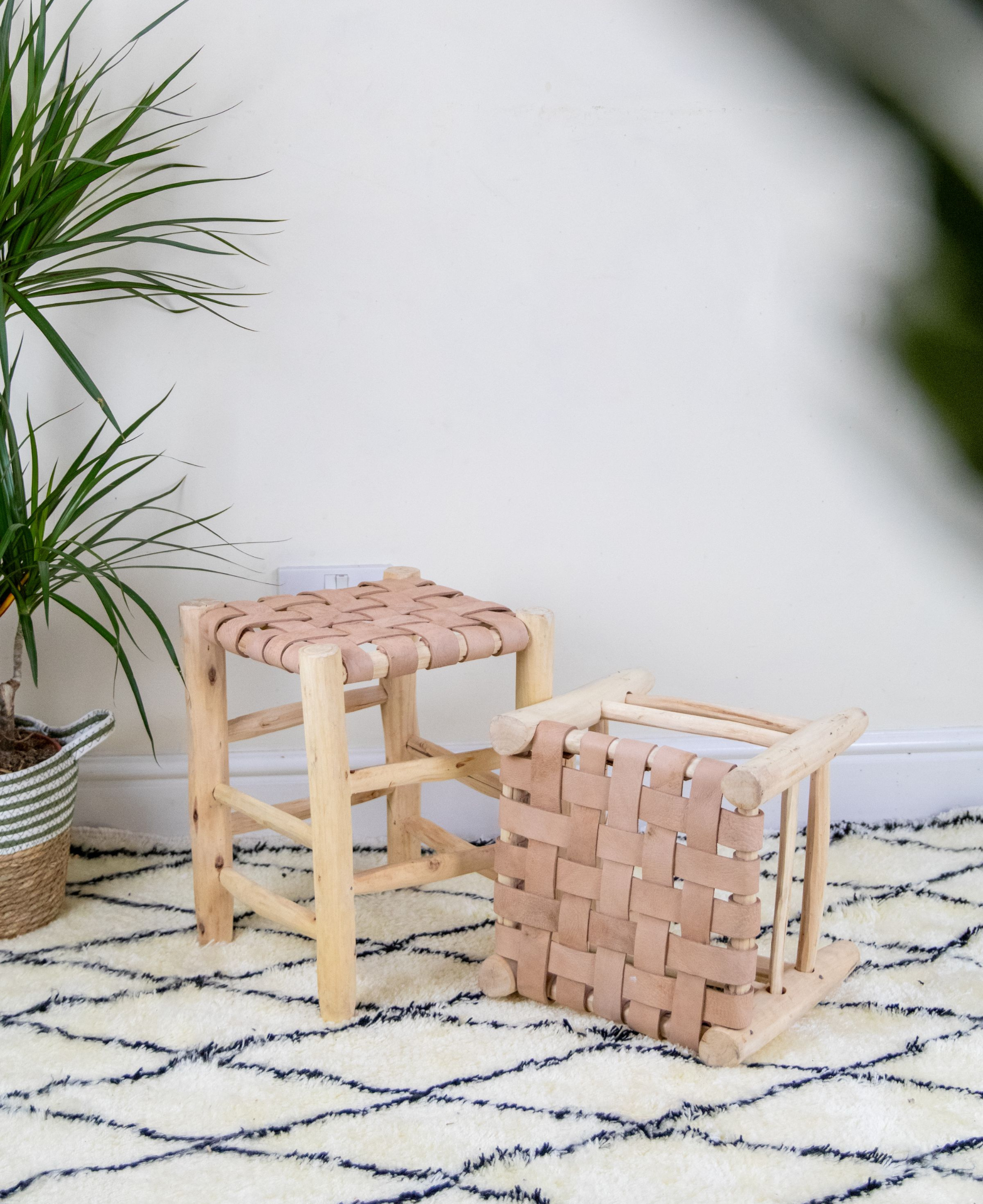 Boho Chic Wooden Stool with Braided Leather Seat - Handmade Moroccan FootstoolMoroccan Laurel Wood Footstool: Braided Leather Seating