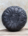 Black Moroccan leather pouf – front view