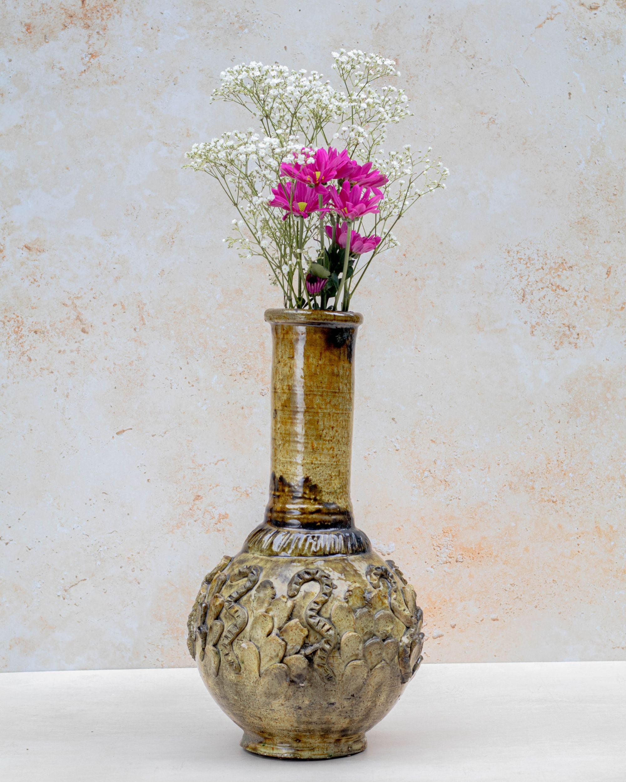Close-up of hand-carved relief on Tamegroute vase