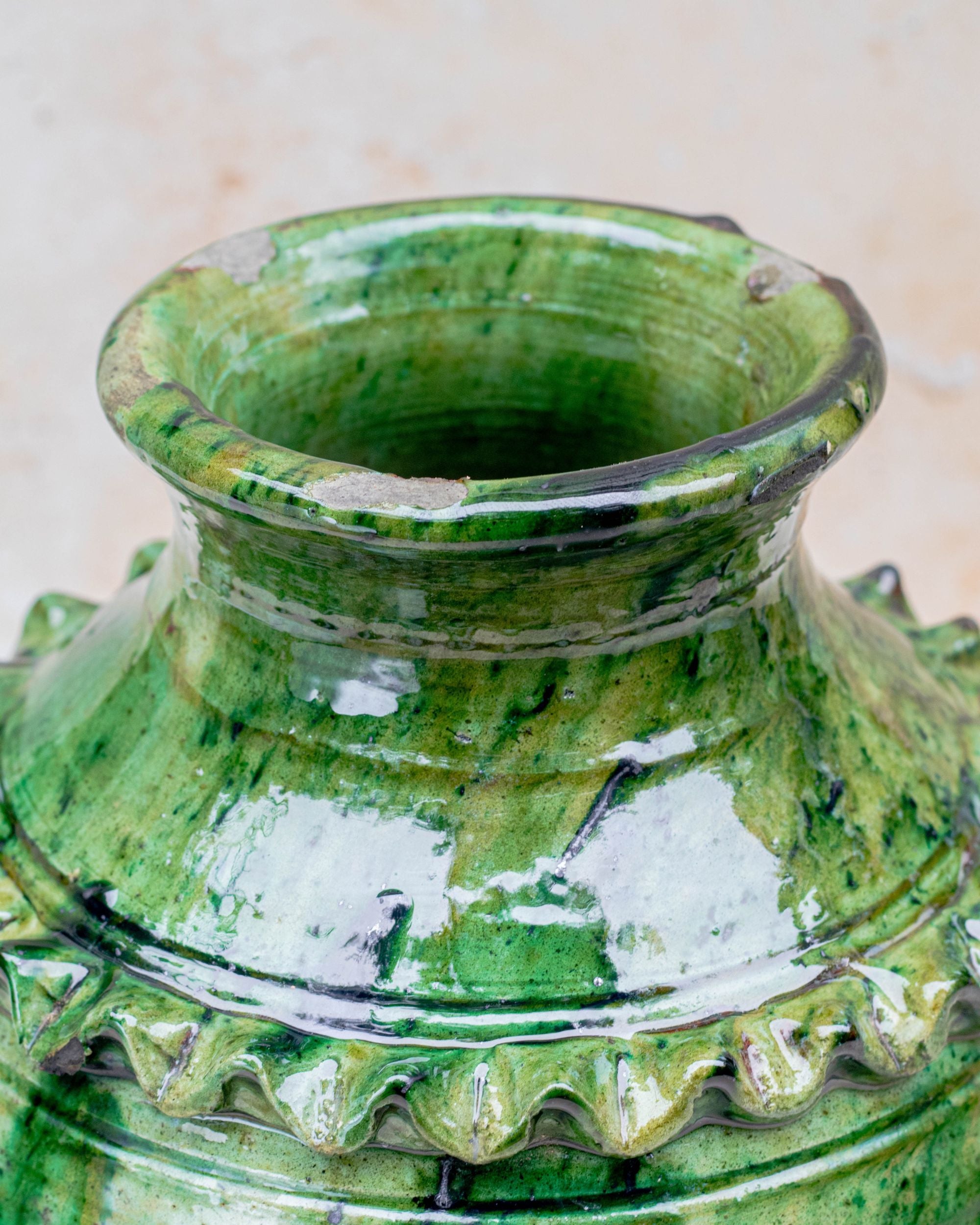 Green glazed ceramic vase with twin handles