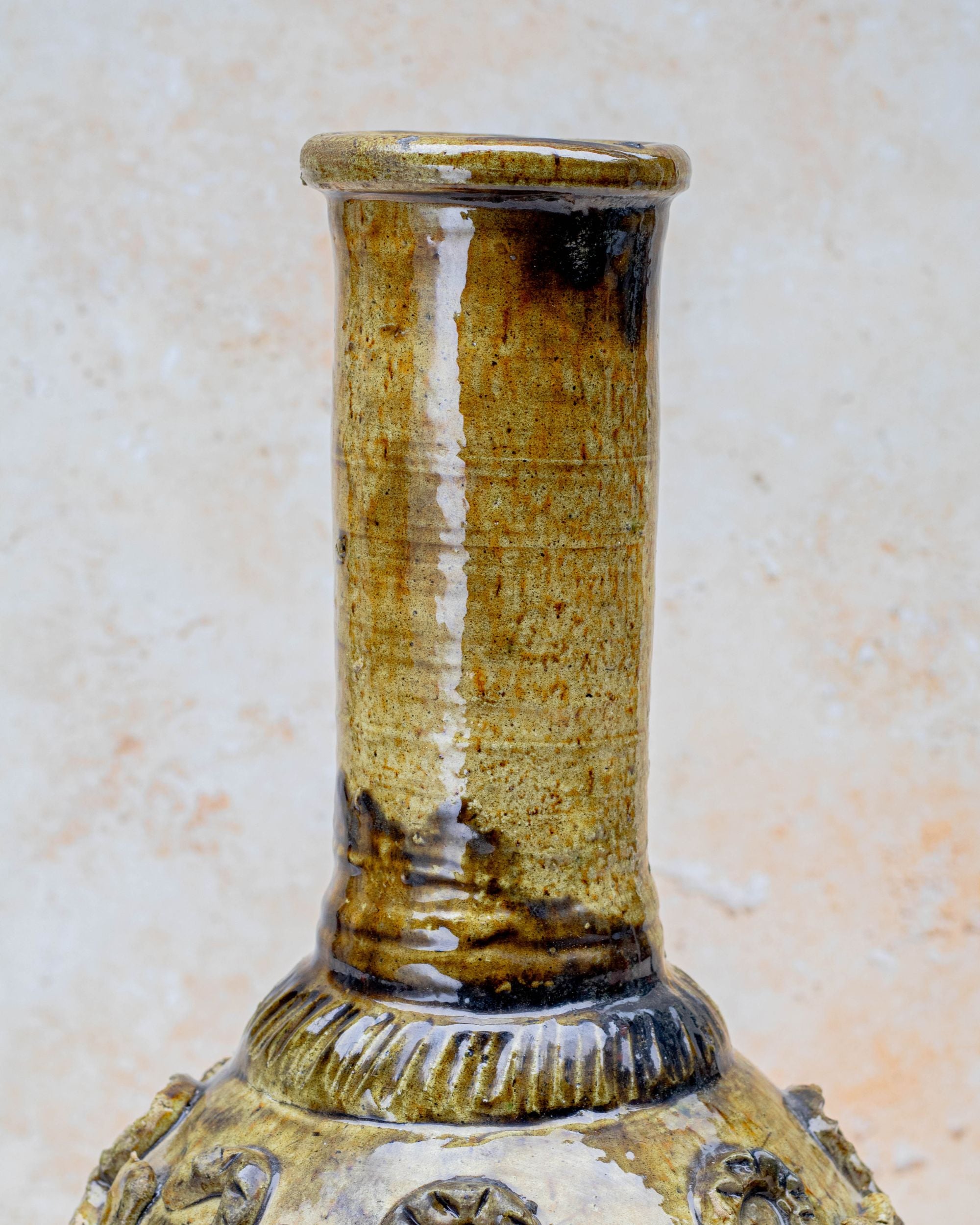 Moroccan pottery vase with carved snake motifs