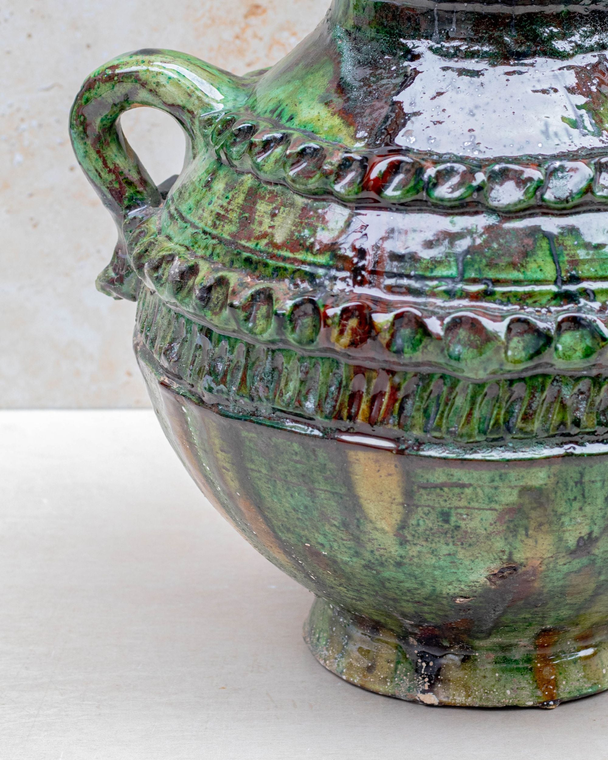 Moroccan pottery vase with textured surface and deep glaze