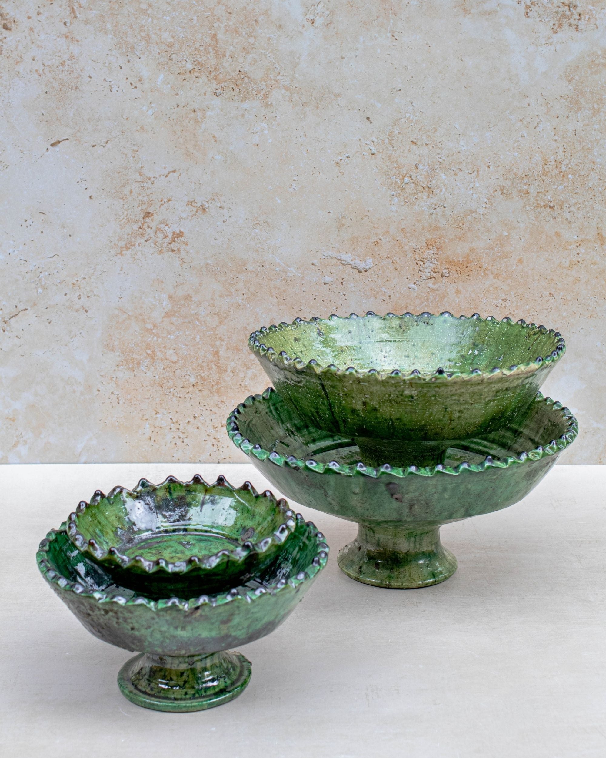 Side profile of bowl showing scalloped rim and raised base