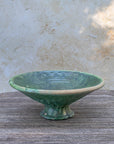 Top view of handcrafted Moroccan green bowl showing texture